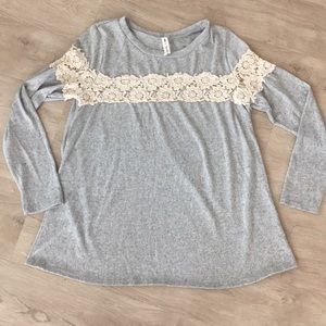 Grey sweater with crochet detail